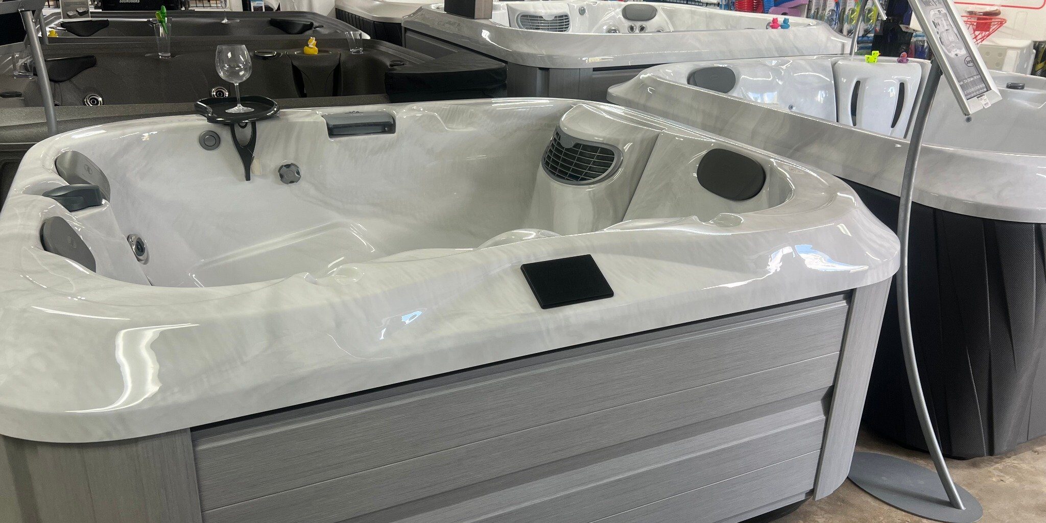 Jacuzzi® Spa Showroom – Ocala Pool Boys Jacuzzi® spa showroom at Ocala Pool Boys in Ocala, Florida, featuring a new shipment of hot tubs